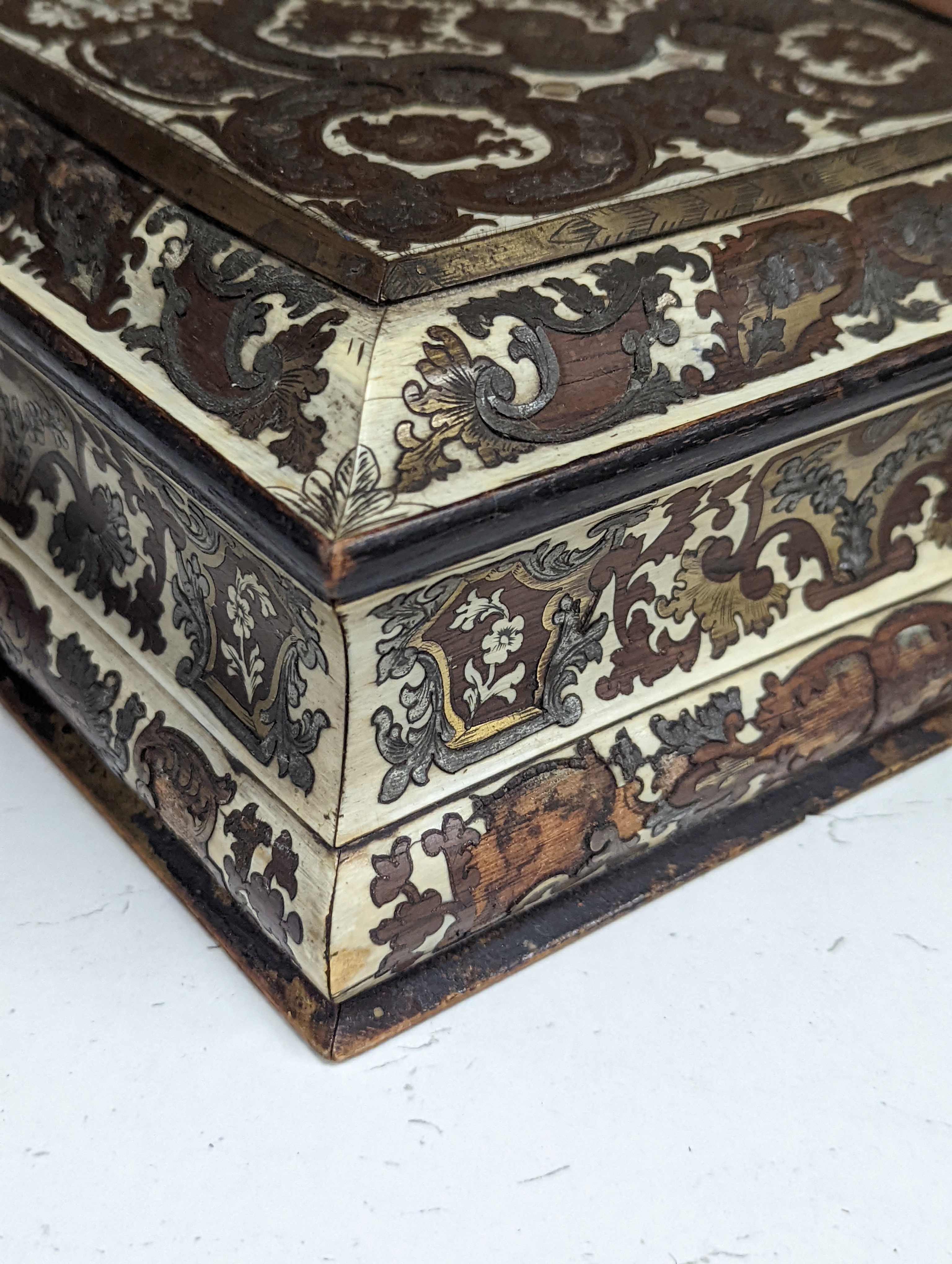 A 19th century French cut brass pewter and ivory inlaid jewellery box, h 10cm, 27 x 19cm, together with a parquetry box (2)